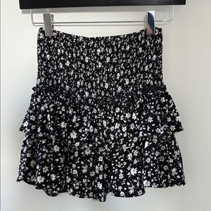 Isabelle’s cabinet come together mini skirt, black with white flowers